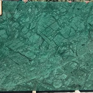 verde guatemala marble slab with intricate patterns